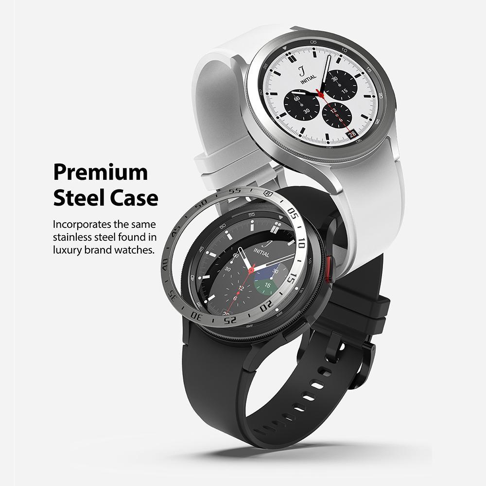 Galaxy Watch 4 Classic 42mm | Bezel Styling - Galaxy Watch 4 Classic 42mm | Two stainless steel smartwatches with white and black silicone bands stacked vertically.