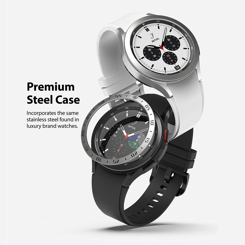Galaxy Watch 4 Classic 46mm | Bezel Styling - Two stainless steel smartwatches with white and black bands stacked.