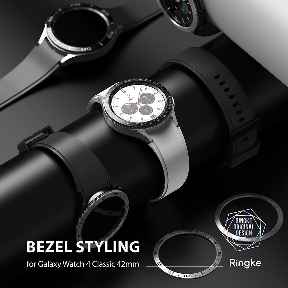 Galaxy Watch 4 Classic 42mm | Bezel Styling - Silver Galaxy Watch 4 with a black tachymeter bezel accessory attached.