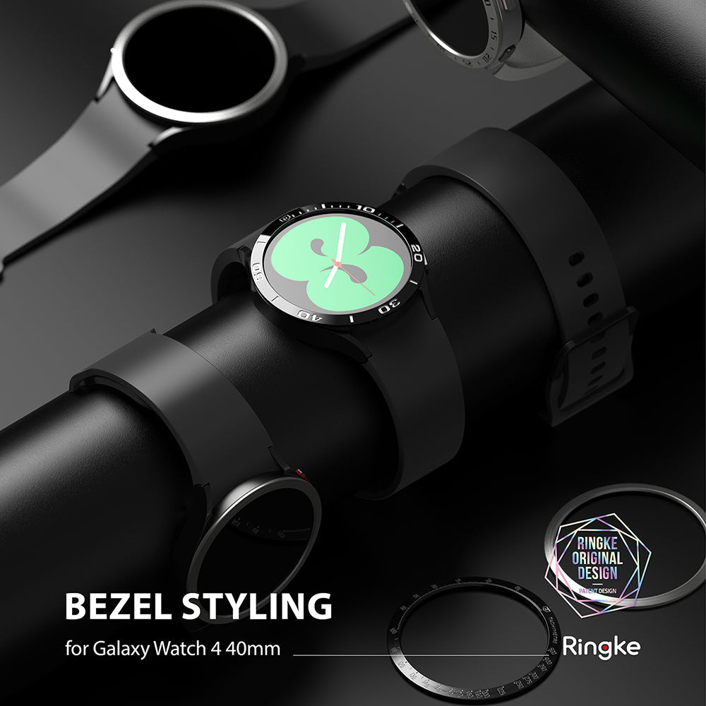 Galaxy Watch 5/4 40mm | Bezel Styling - Black smartwatch with a numbered adhesive bezel ring attached to a display stand.