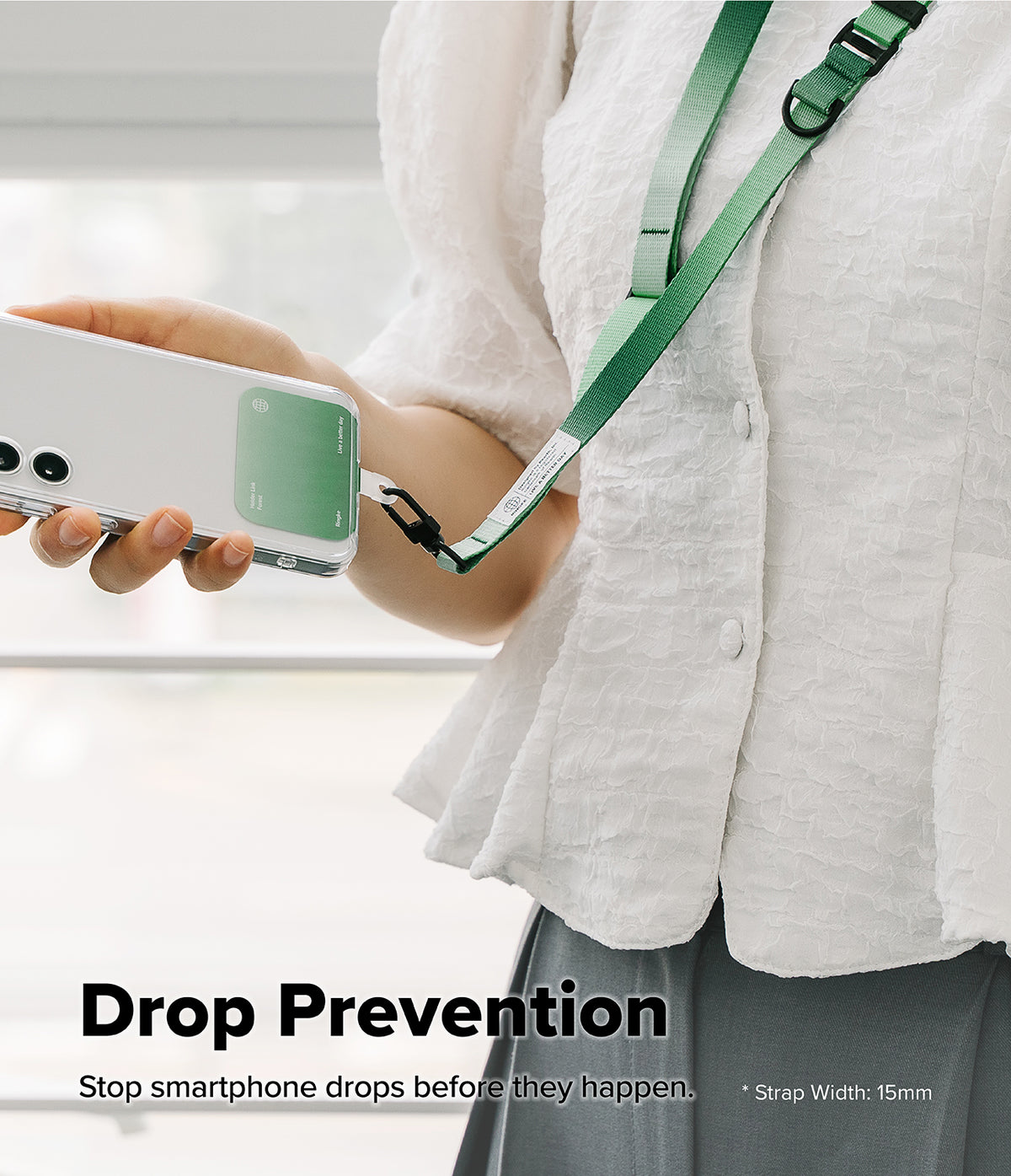 Holder Link & Snap Hook Lanyard Strap - Person holding a smartphone attached to a green lanyard via a snap hook.