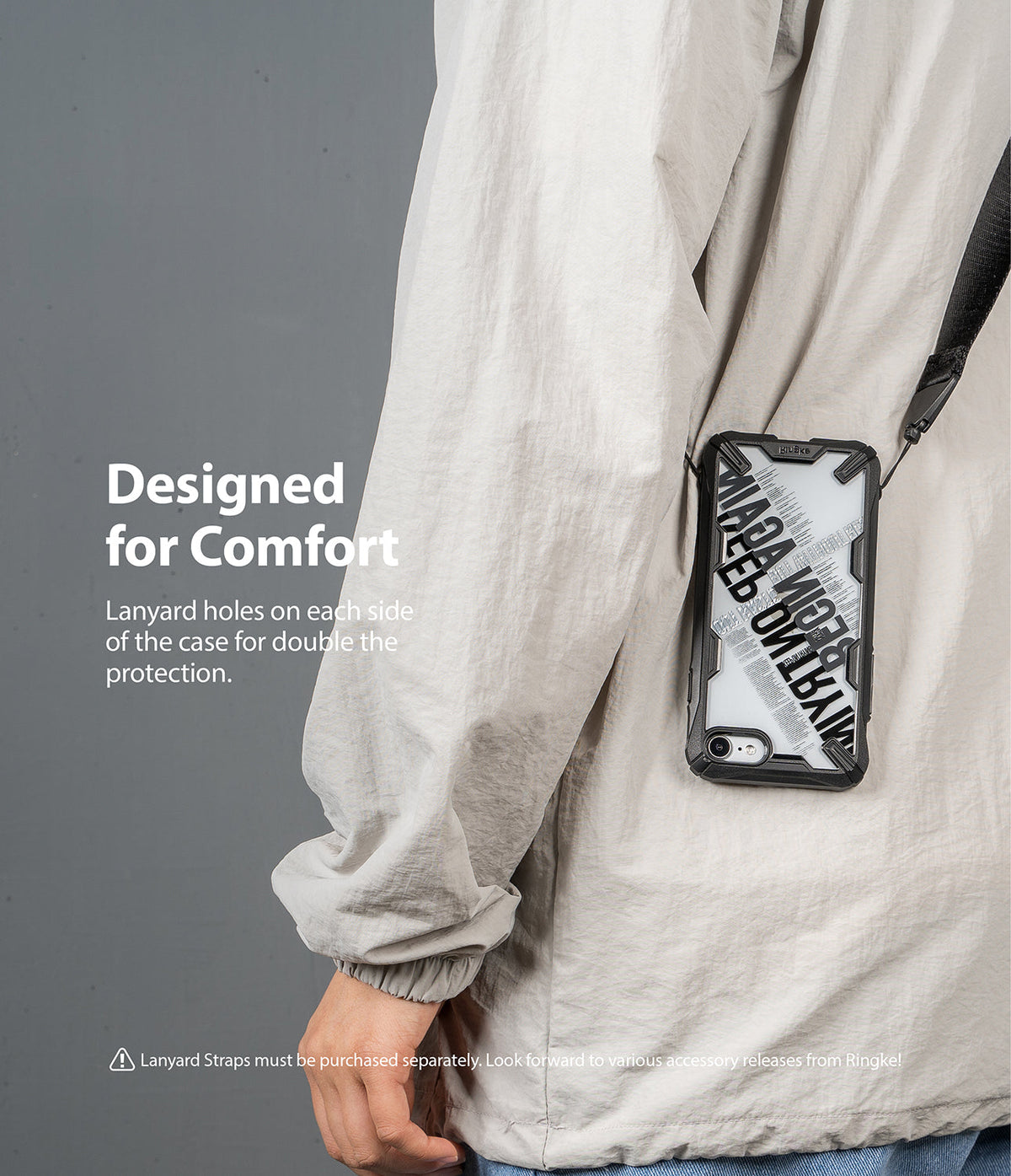 iPhone SE 2022 5G / SE 2020 / 8 Case | Fusion-X Design - A phone in a rugged case with a lanyard strap worn over a jacket.
