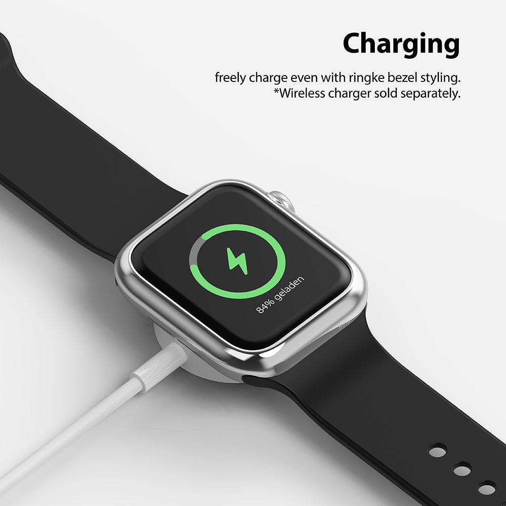 Apple Watch Series 6 / 5 / 4 / SE (40mm) | Bezel Styling - Apple Watch with silver bezel styling charging wirelessly.