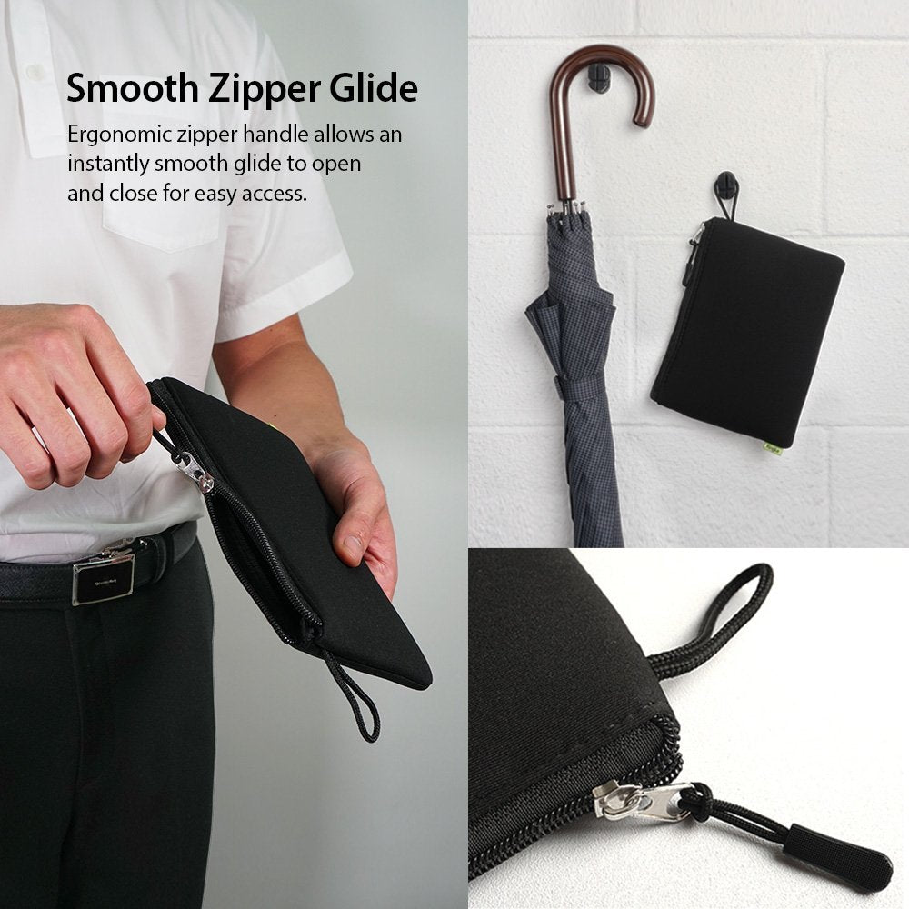 Cushion Pouch - A person opening a black zippered pouch, with the pouch hanging on a wall hook next to an umbrella.