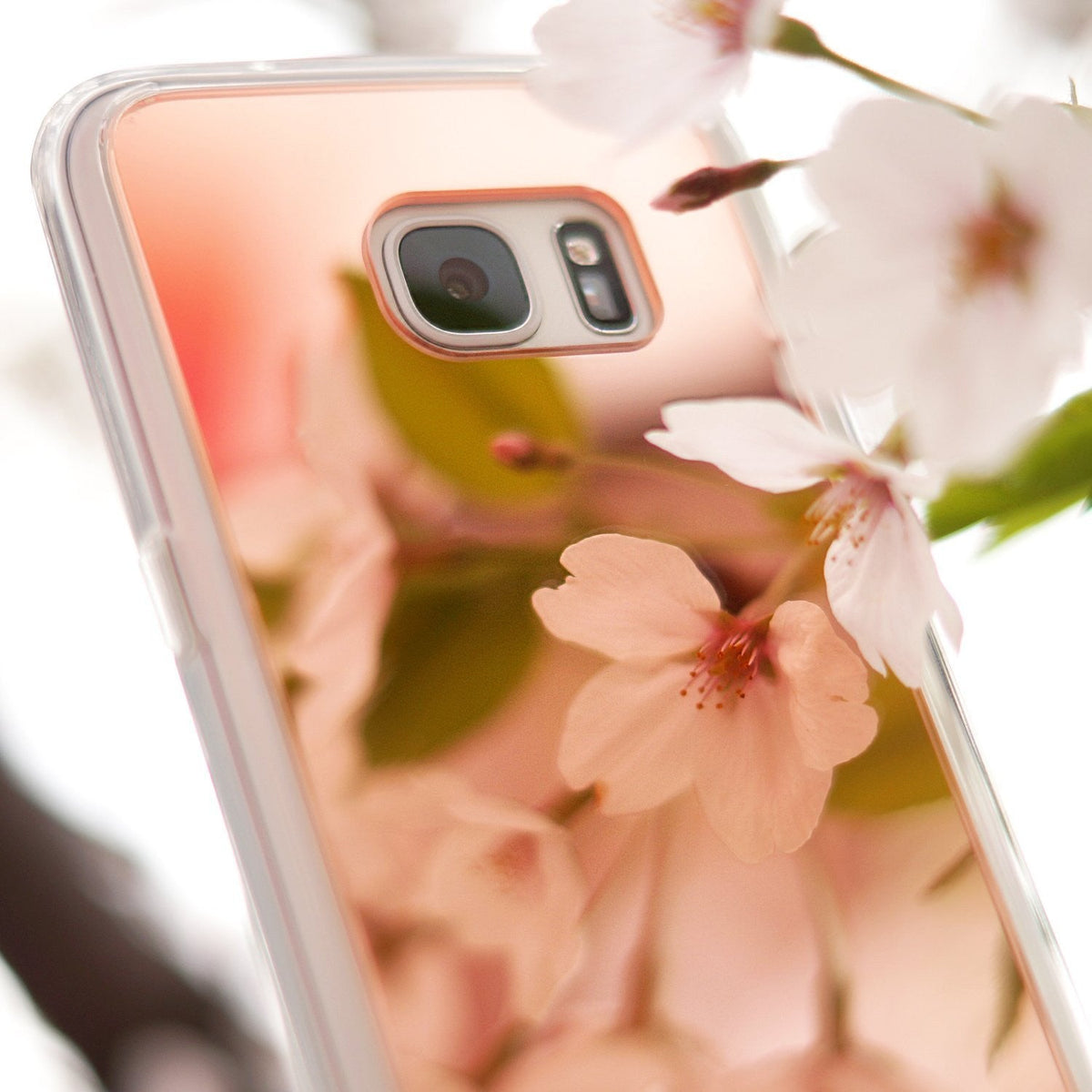 Galaxy S7 Case | Mirror - Rose gold mirror phone case reflecting soft pink cherry blossoms against a bright background.