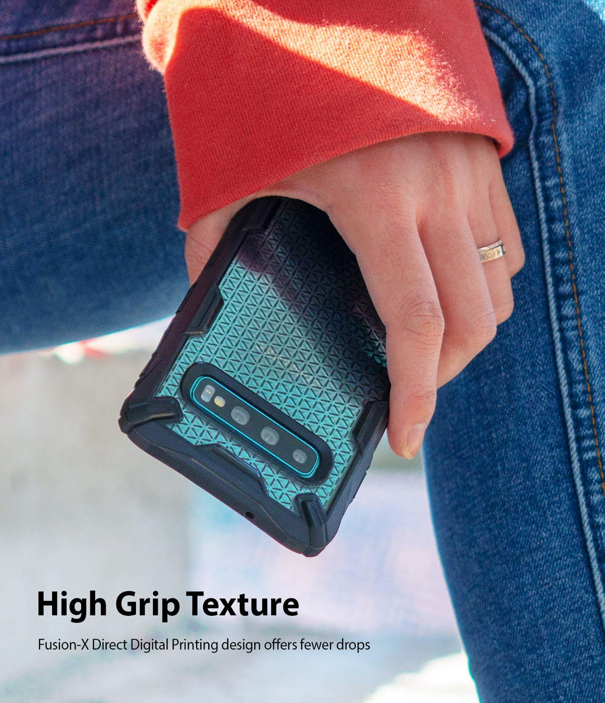 Galaxy S10 Case | Fusion-X Design - Hand holding a phone in a black, textured protective case with a geometric pattern.