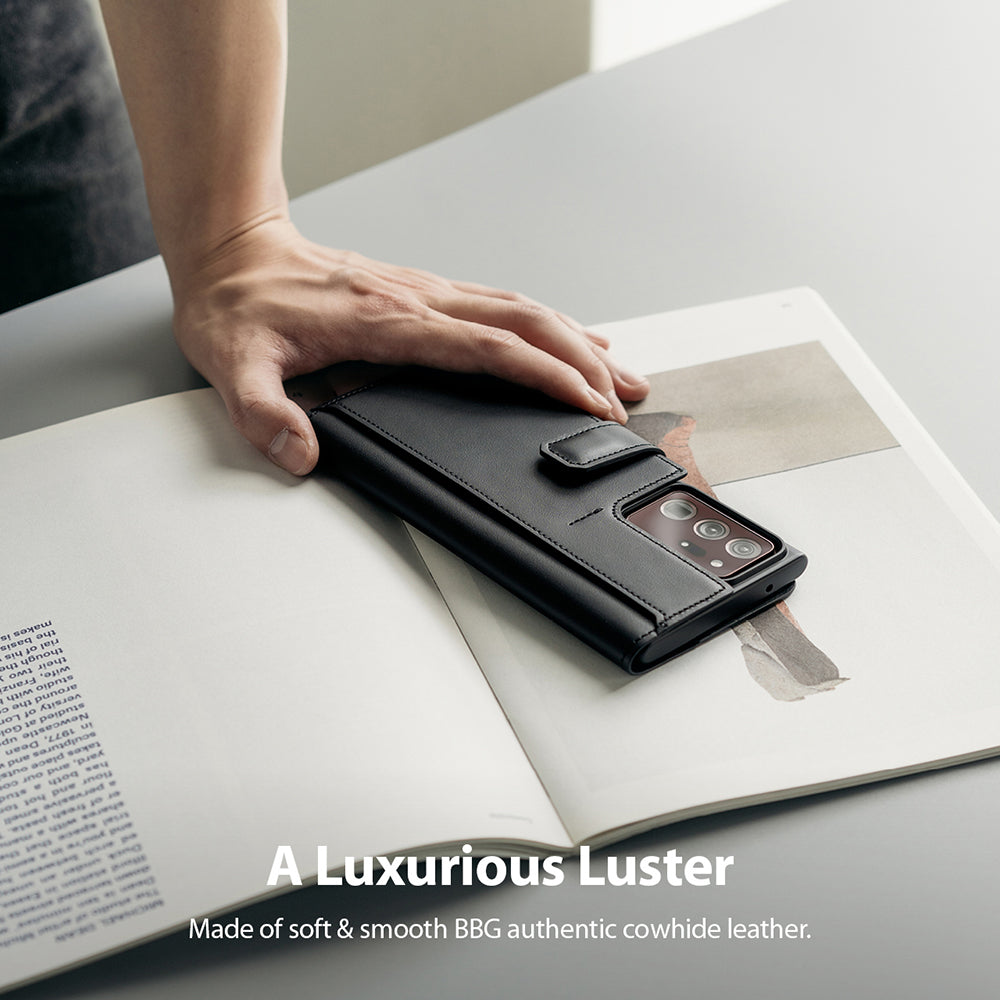 Galaxy Note 20 Ultra Case | Folio Signature+ - Hand resting on a black leather folio case for a Galaxy Note 20 Ultra.