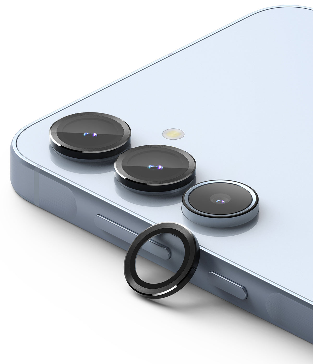 Galaxy A55 / A35 | Camera Lens Frame Glass - A light blue smartphone with three camera lenses and one loose black lens ring.