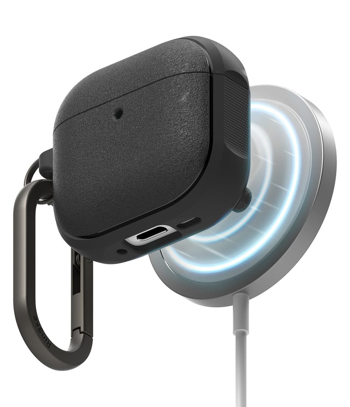 AirPods 5 / 4 Case | Onyx Magnetic - Black textured AirPods 4 case with a carabiner attached to a glowing magnetic wireless charger.