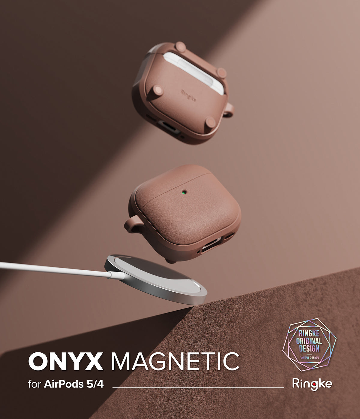 AirPods 5 / 4 Case | Onyx Magnetic - Two brown AirPods 4 cases floating above a magnetic wireless charger on a brown surface.