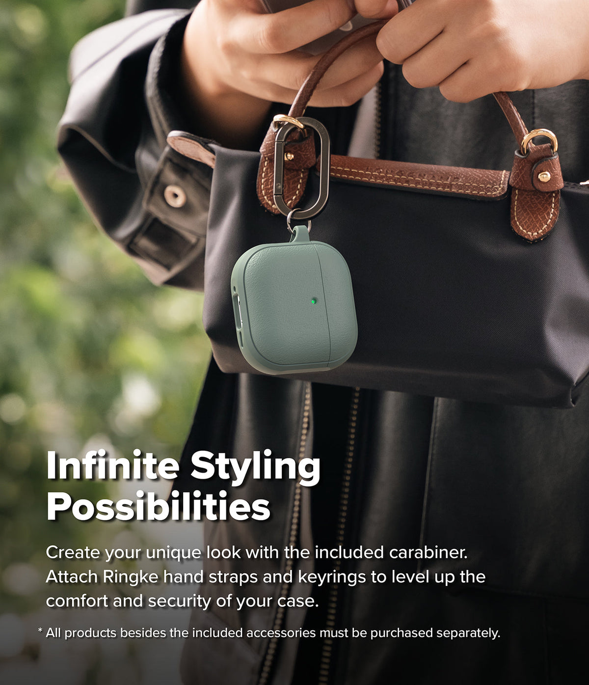 AirPods 5 / 4 Case | Onyx Magnetic - Sage green AirPods 4 case with a carabiner attached to a black handbag held by a person.
