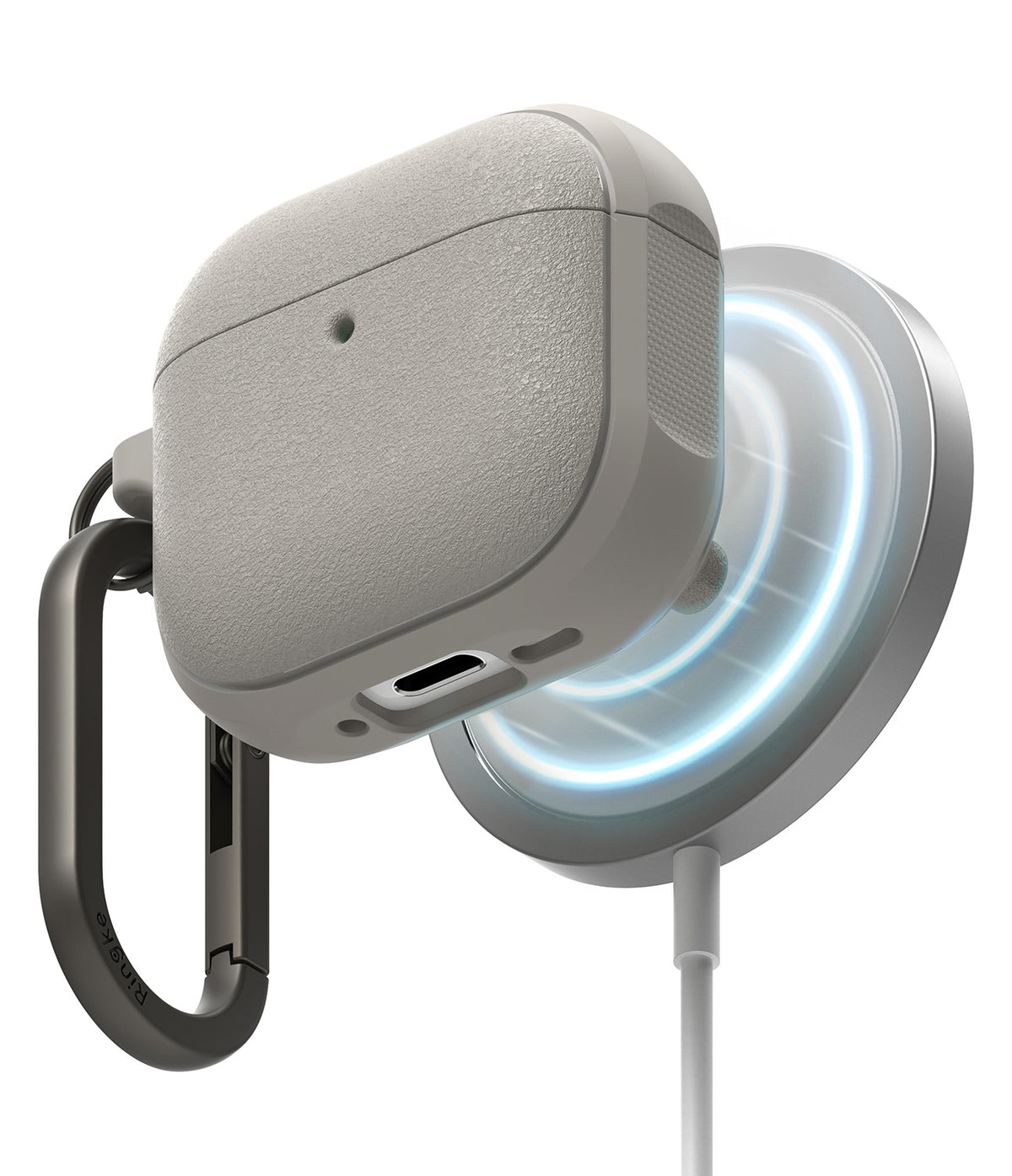 AirPods 5 / 4 Case | Onyx Magnetic - Textured grey AirPods 4 case magnetically attached to a glowing wireless charger.