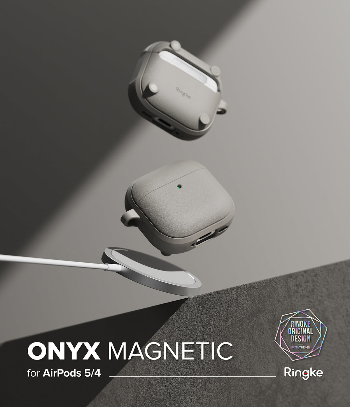 AirPods 5 / 4 Case | Onyx Magnetic - Two gray AirPods 4 cases floating above a magnetic wireless charger on a gray background.