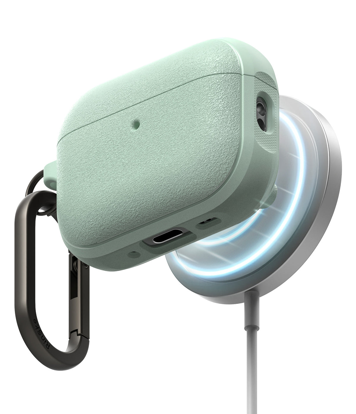 AirPods Pro 3 Case | Onyx Magnetic - Textured sage green case charging wirelessly on a magnetic dock with a black carabiner.