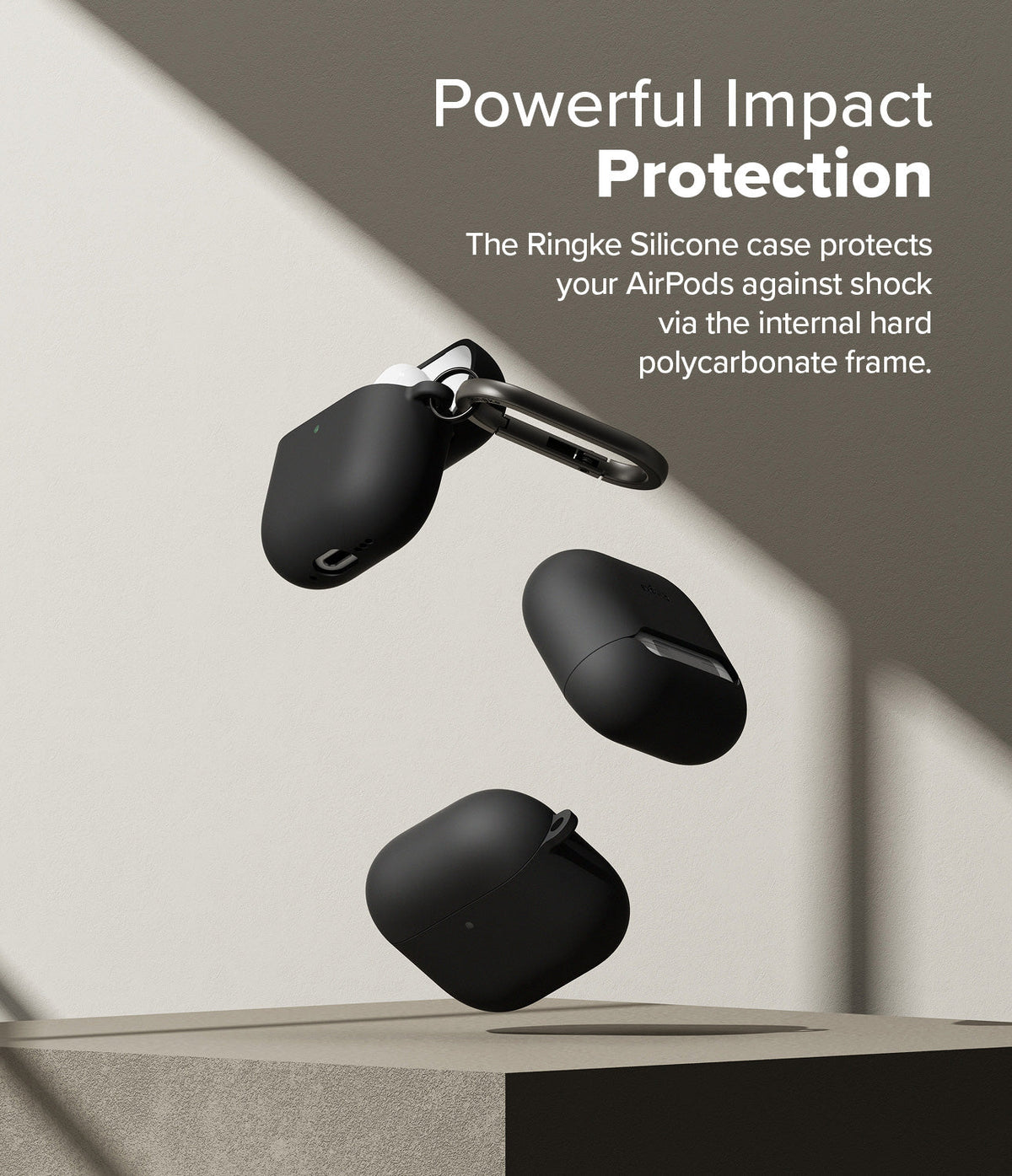 AirPods 5 / 4 Case | Silicone Case - AirPods 4 Case - Three black silicone AirPods 4 cases floating above a pedestal against a minimalist beige background.