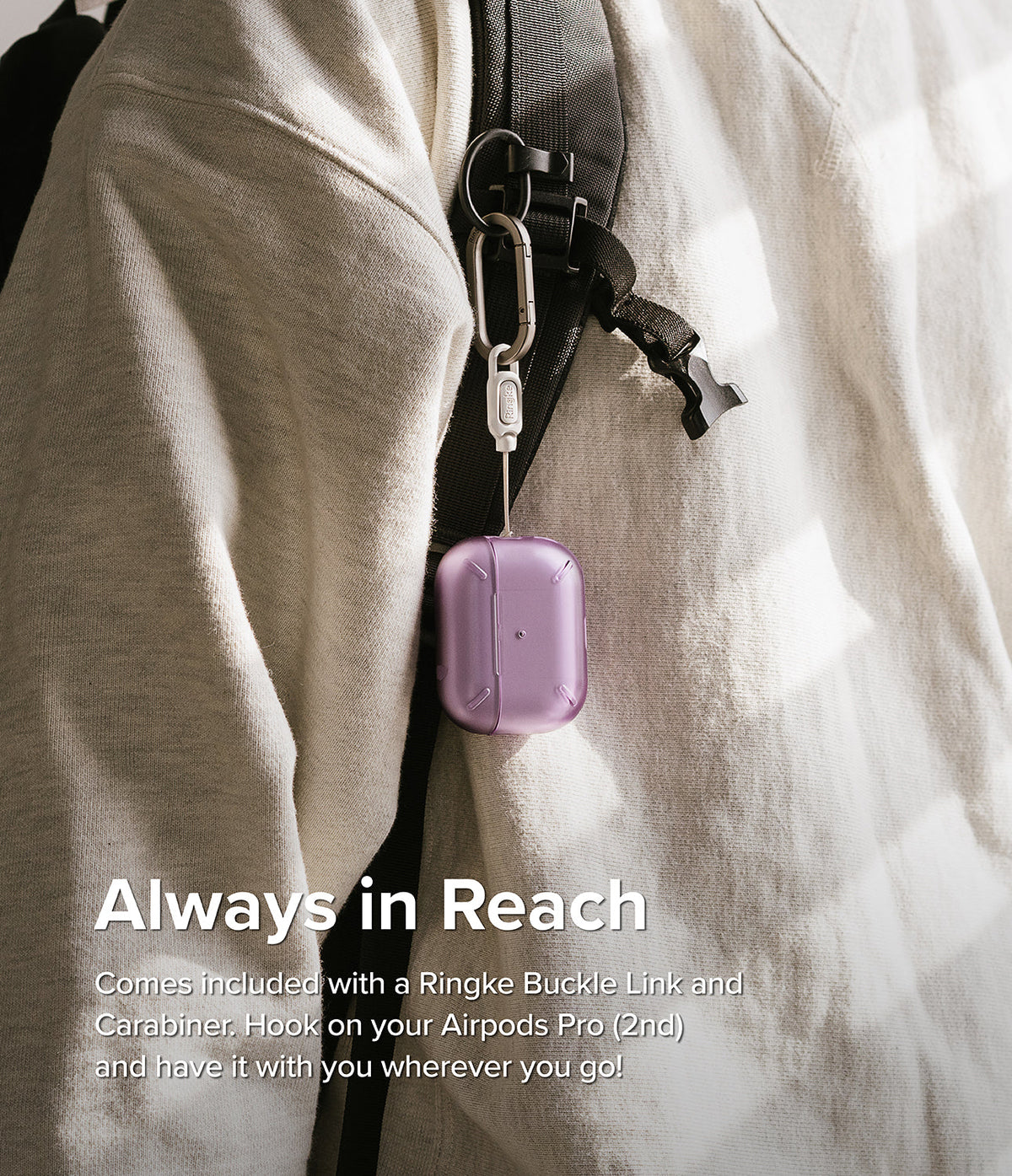 AirPods Pro 2 Case | Layered - Purple protective case hanging from a backpack strap via a carabiner and buckle link.
