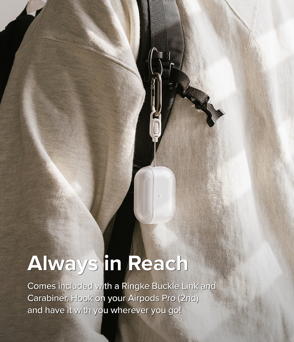 AirPods Pro 2 Case | Layered - Clear protective case hanging from a backpack strap via a metal carabiner and buckle link.