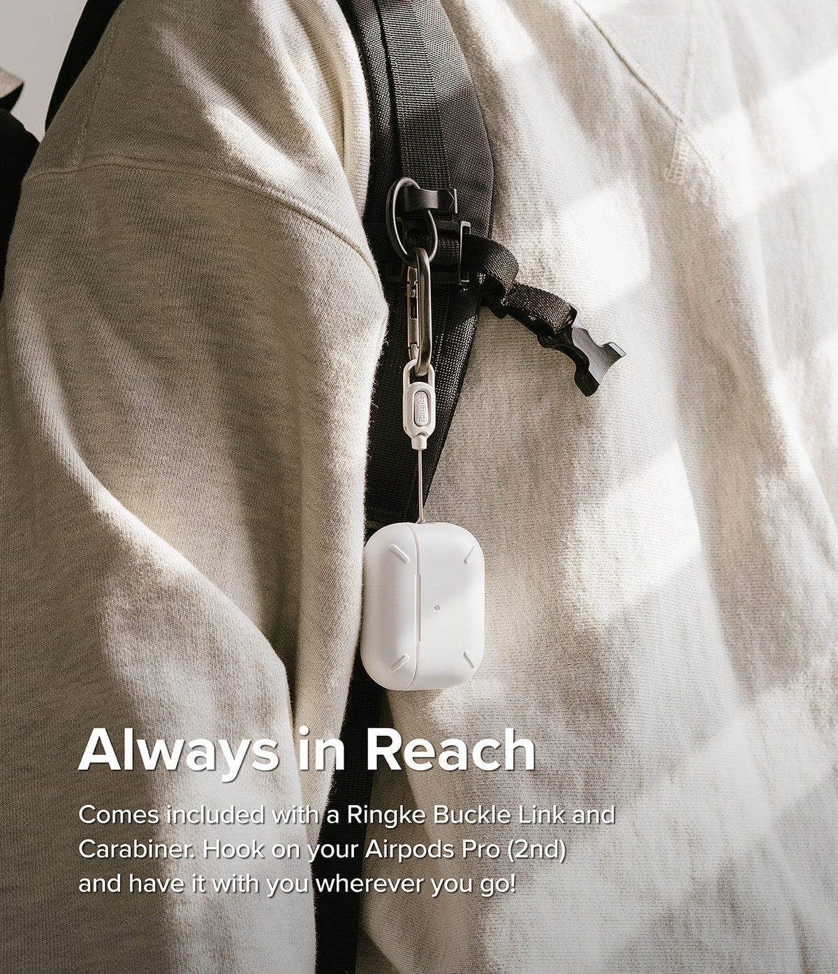 AirPods Pro 2 Case | Layered - White AirPods Pro 2 case with a carabiner attached to a backpack strap.