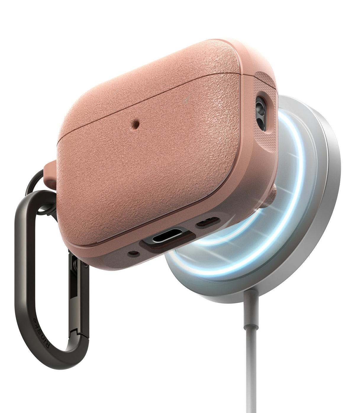 AirPods Pro 3 Case | Onyx Magnetic - Textured rose gold AirPods Pro case magnetically charging on a glowing white dock.