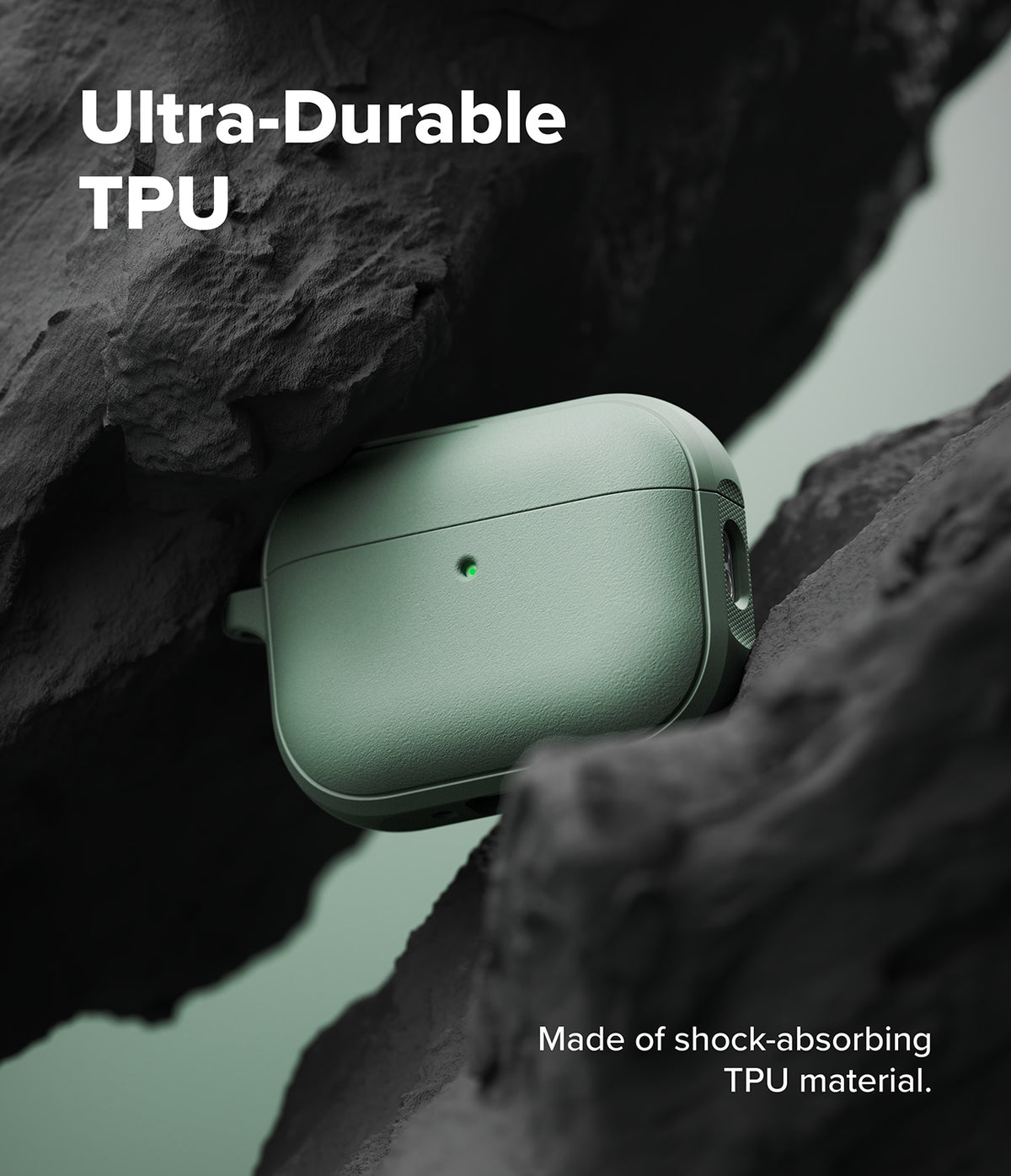 AirPods Pro 3 Case | Onyx Magnetic - Sage green AirPods Pro case wedged between dark, textured volcanic rocks.