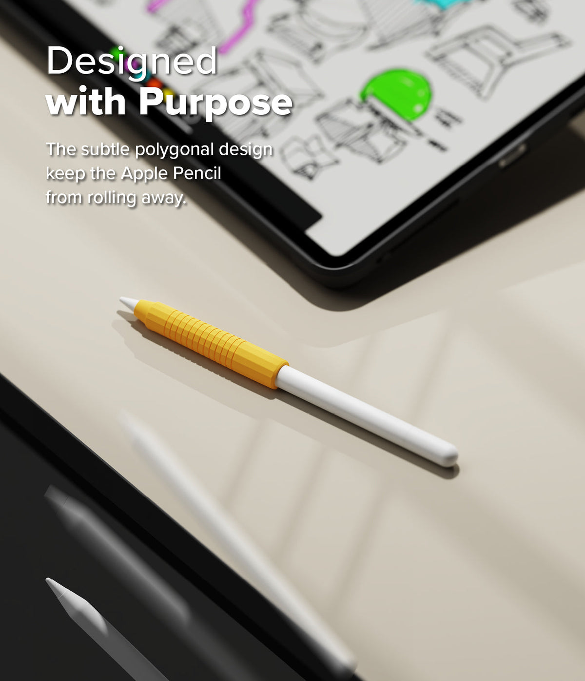 Apple Pencil Case | Silicone Drafting Grip Holder - Apple Pencil Case - Yellow silicone drafting grip on an Apple Pencil resting on a desk near a tablet.