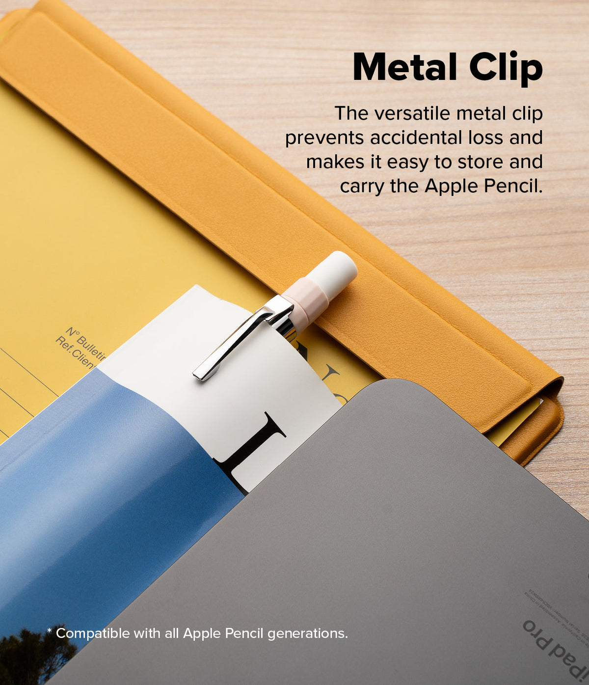 Apple Pencil USB-C Case | Silicone Drafting Pencil Case - Apple Pencil USB-C Case - A silicone Apple Pencil case with a metal clip attached to a notebook on a wooden desk.