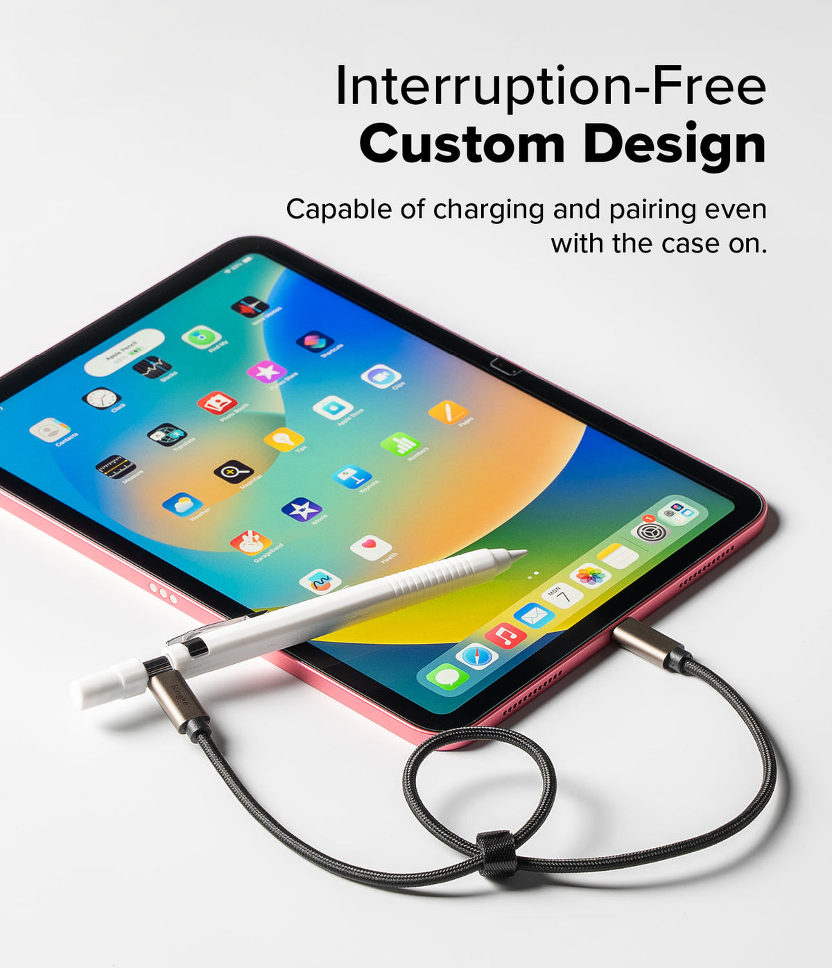 Apple Pencil USB-C Case | Silicone Drafting Pencil Case - Apple Pencil USB-C Case - A white silicone case on an Apple Pencil connected to a USB-C charging cable near a pink iPad.