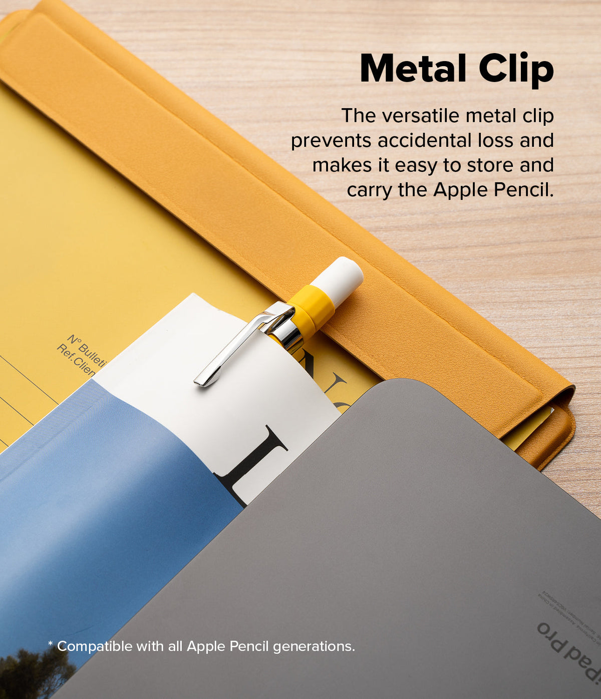 Apple Pencil USB-C Case | Silicone Drafting Pencil Case - Apple Pencil USB-C Case - A yellow silicone Apple Pencil case with a metal clip attached to a notebook on a wooden desk.