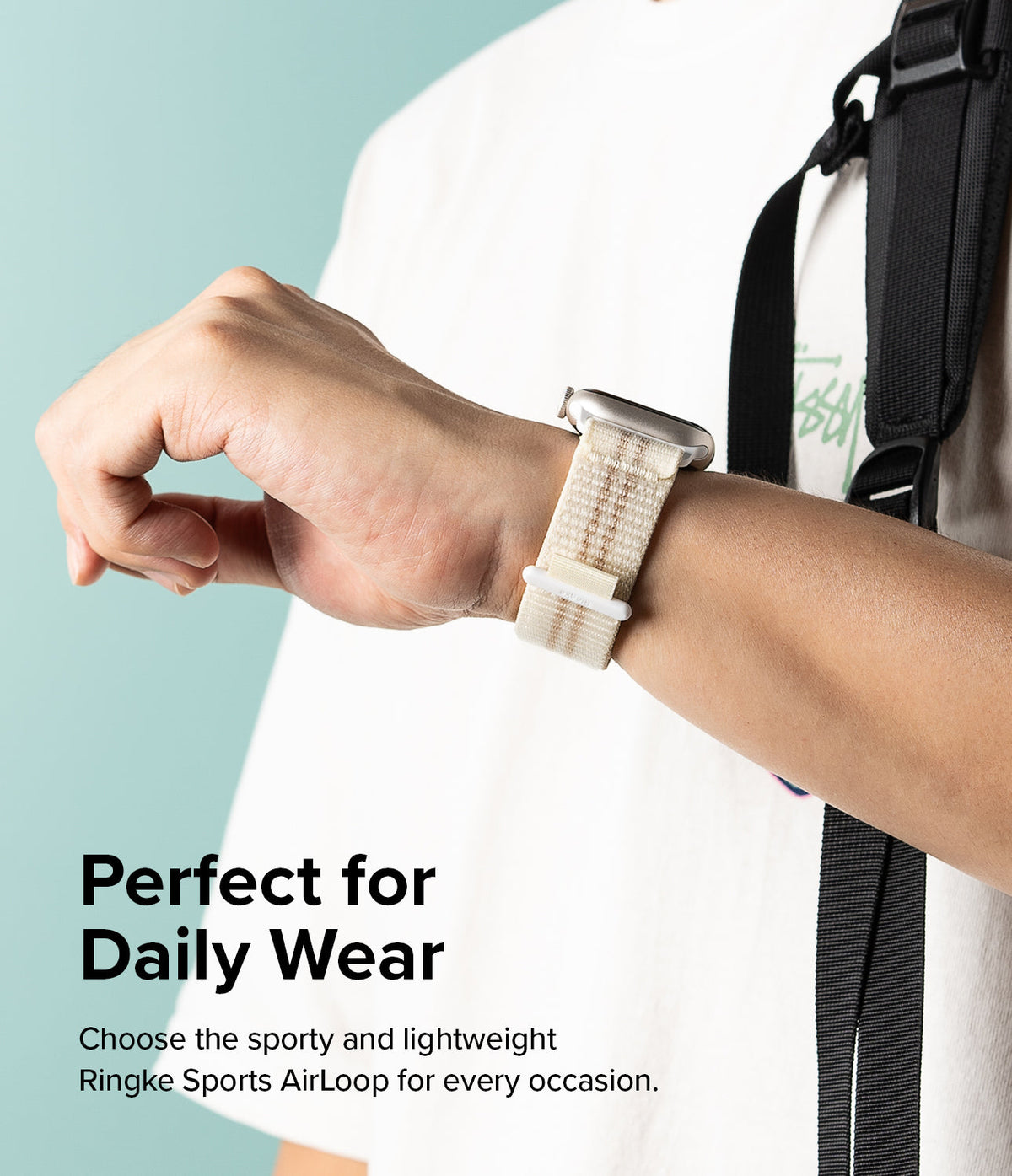 Apple Watch 42·41·40·38 mm | Sports Air Loop - Person wearing a beige woven sports watch band on an Apple Watch.