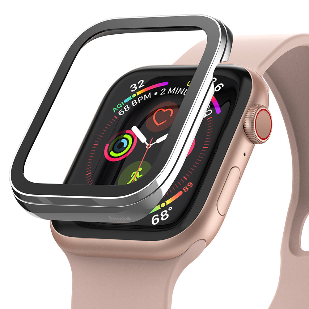 Apple Watch Series 6 / 5 / 4 / SE (40mm) | Premium Bezel Styling Silver + Black - Silver and black bezel hovering over a gold Apple Watch with a pink sport band.