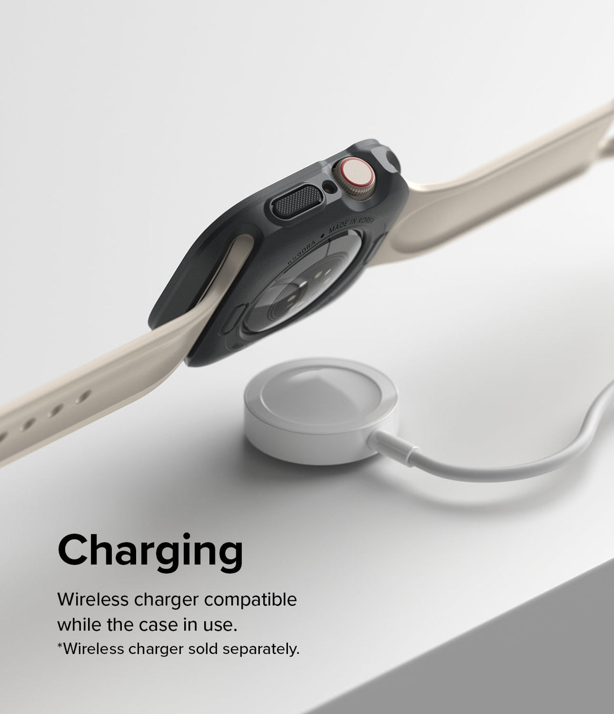 Apple Watch Series (41mm / 40mm) Case | Air Sports - Dark gray protective case on an Apple Watch hovering over a charger.