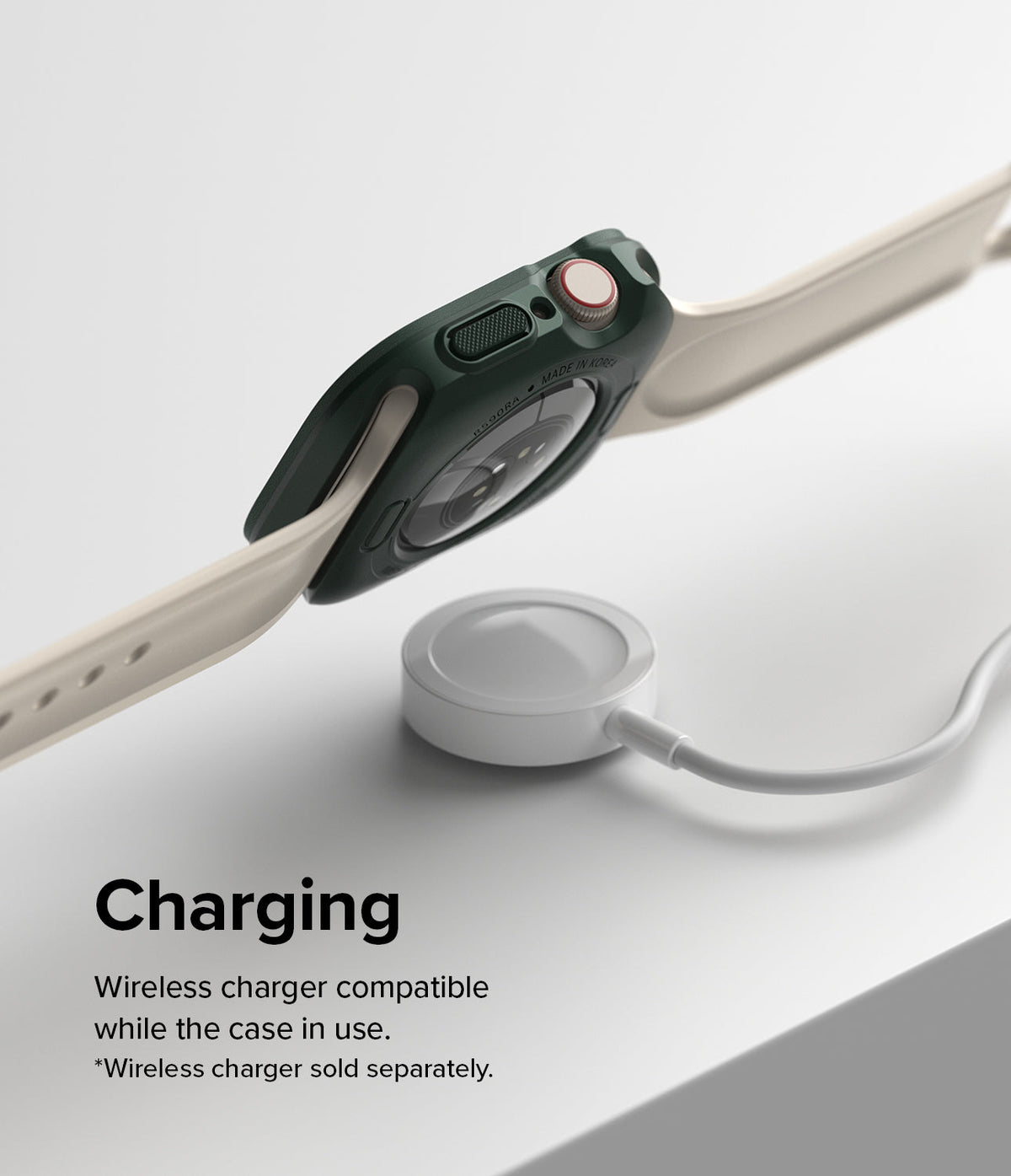 Apple Watch Series (41mm / 40mm) Case | Air Sports - Dark green protective case on an Apple Watch hovering over a wireless charger.