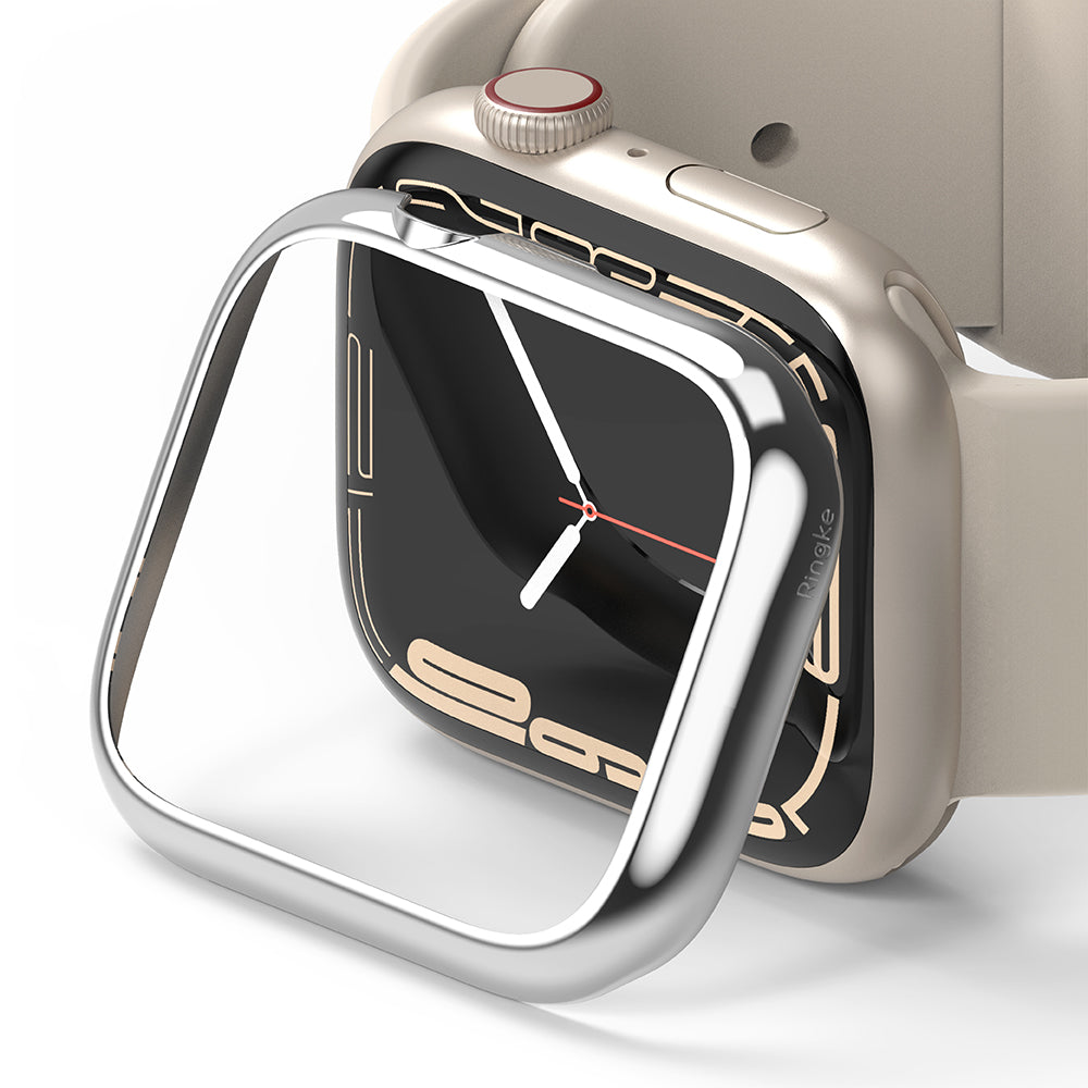 Apple Watch 9 / 8 / 7 (45mm) | Bezel Styling - A silver metallic bezel styling frame hovering over a beige Apple Watch.