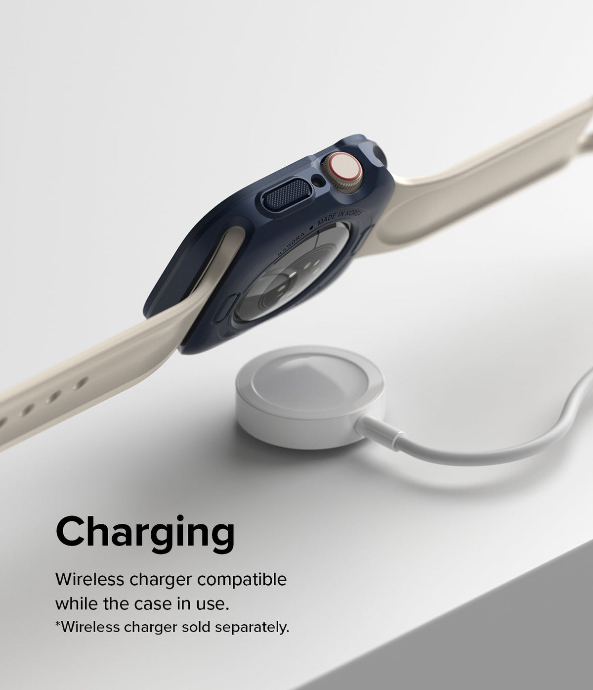 Apple Watch Series (45mm / 44mm) Case | Air Sports - Navy blue protective case on an Apple Watch charging wirelessly.