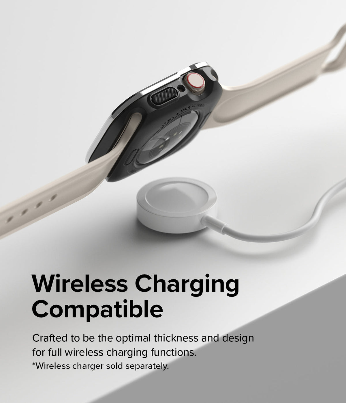 Apple Watch Series (45mm / 44mm) | Air Sports (Black) + Bezel Styling - Black watch case hovering over a wireless charger.