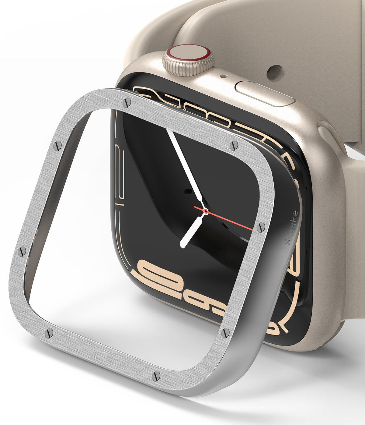 Apple Watch 9 / 8 / 7 (41mm) | Bezel Styling Premium - Brushed silver metal bezel cover hovering over a gold Apple Watch.