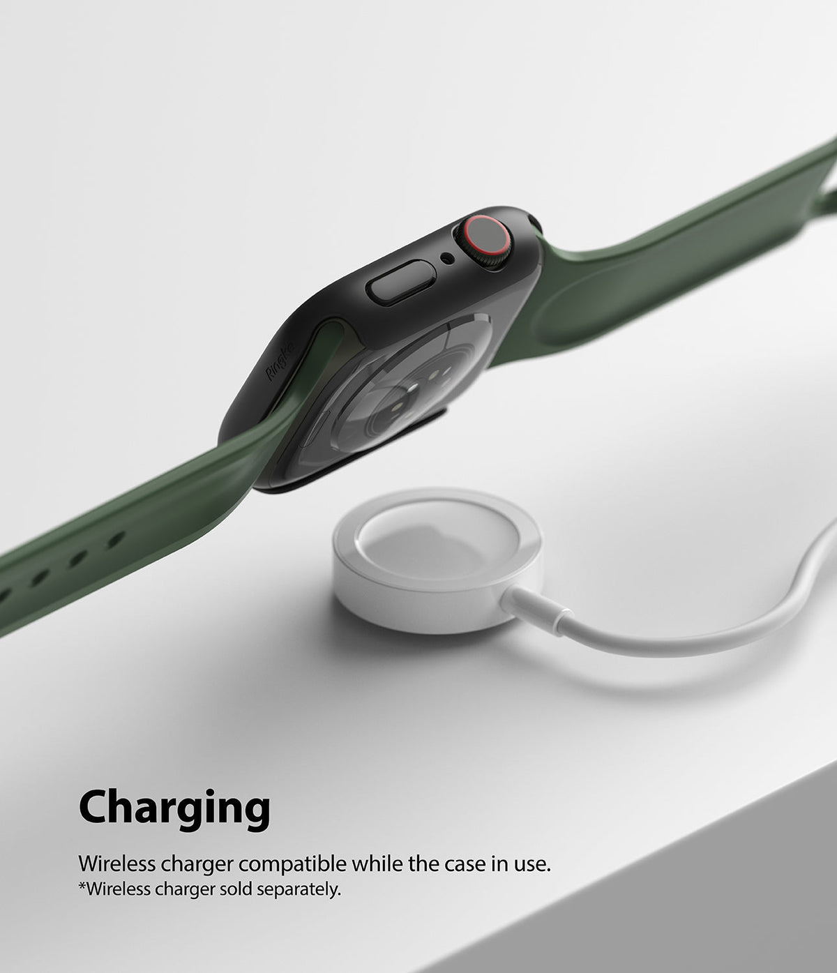 Apple Watch 9 / 8 / 7 (41mm) | Slim - Black slim case on an Apple Watch with a green band hovering over a wireless charger.