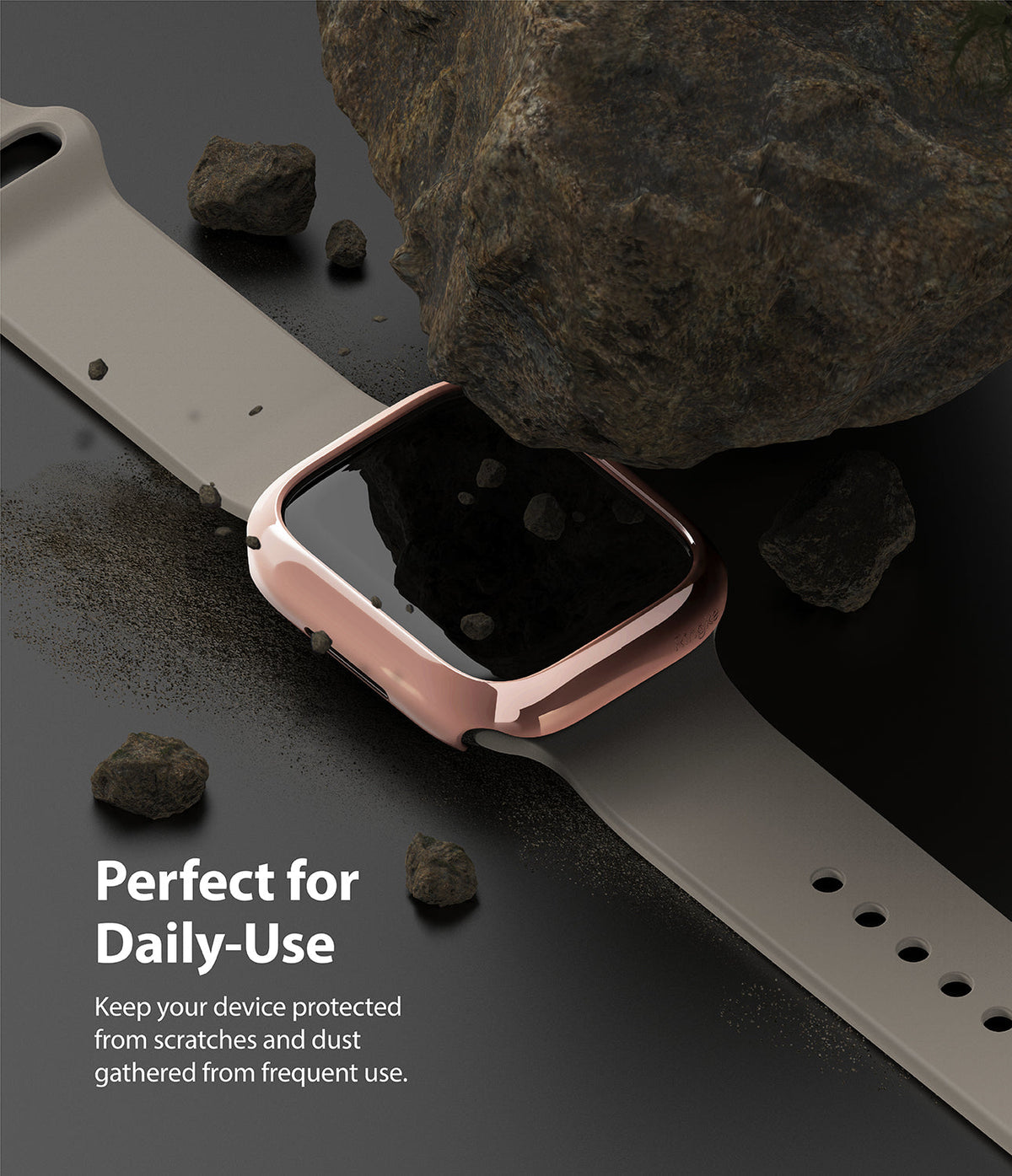Apple Watch 9 / 8 / 7 (41mm) | Slim - Rose gold protective watch case under a large rock on a black surface.
