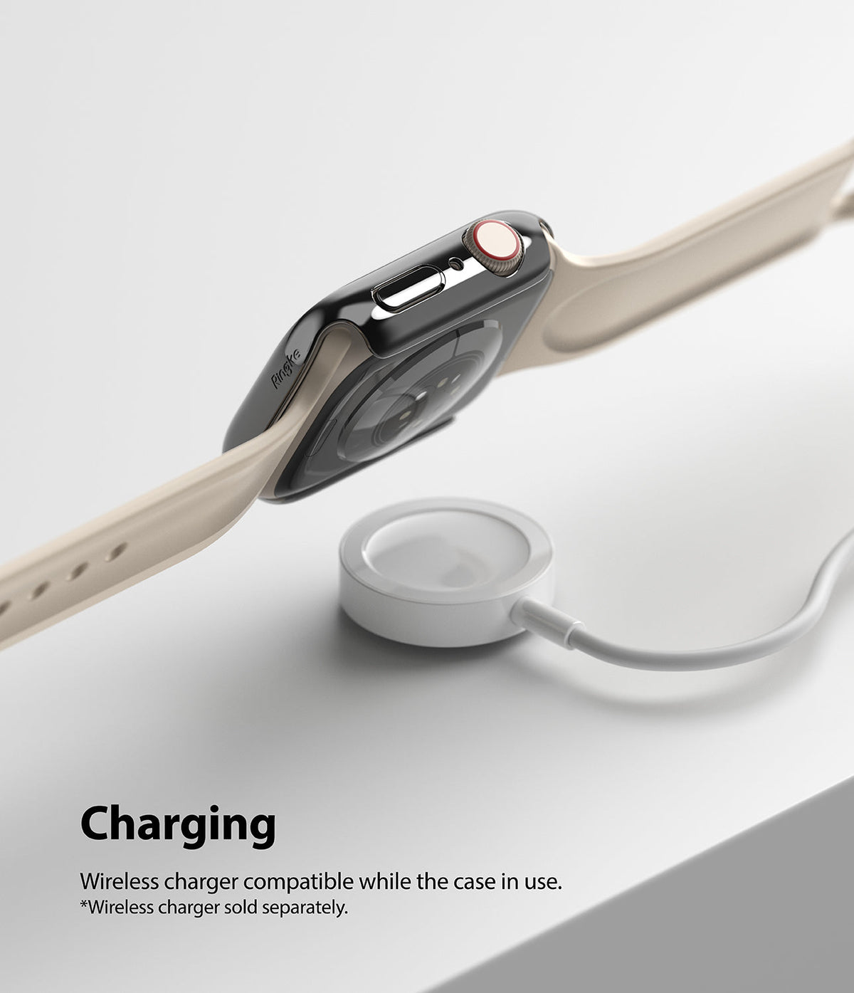 Apple Watch 9 / 8 / 7 (41mm) | Slim - Apple Watch with a slim black protective case hovering above a wireless charging puck.