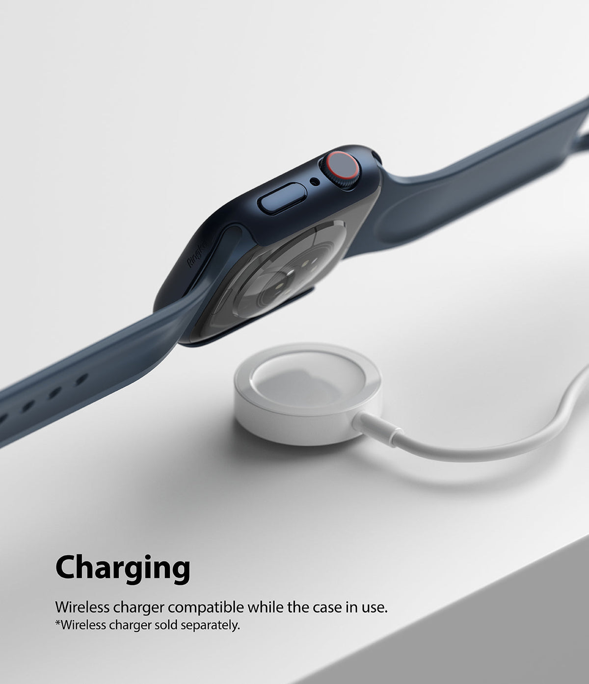 Apple Watch 9 / 8 / 7 (41mm) | Slim - Dark blue Apple Watch with a slim case hovering above a white wireless charger.
