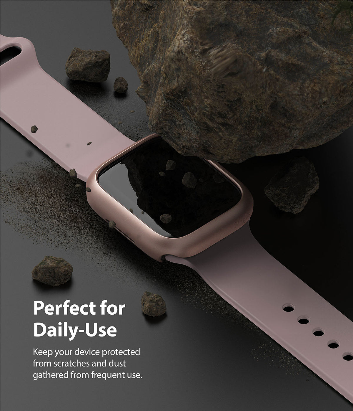 Apple Watch 9 / 8 / 7 (41mm) | Slim - Pink watch case under a large rock with scattered debris on a black surface.