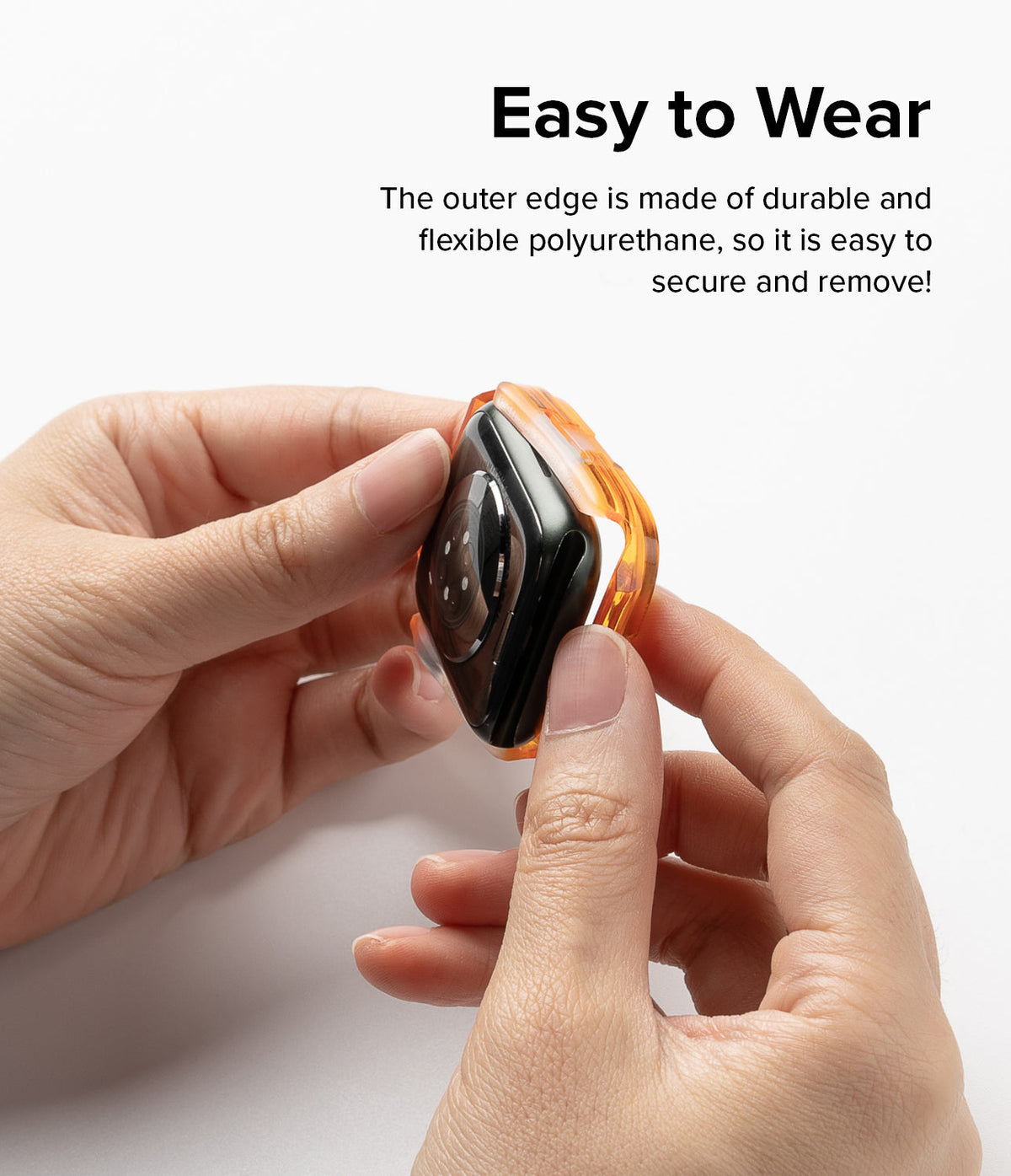 Apple Watch Series (45mm / 44mm) Case | Fusion Bumper - Hands attaching a flexible orange bumper case to an Apple Watch.