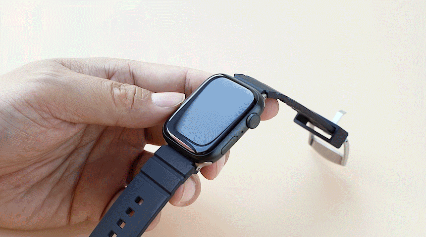 Apple Watch Series (45mm / 44mm) Case | Fusion Bumper - A hand snaps a black protective bumper onto an Apple Watch.