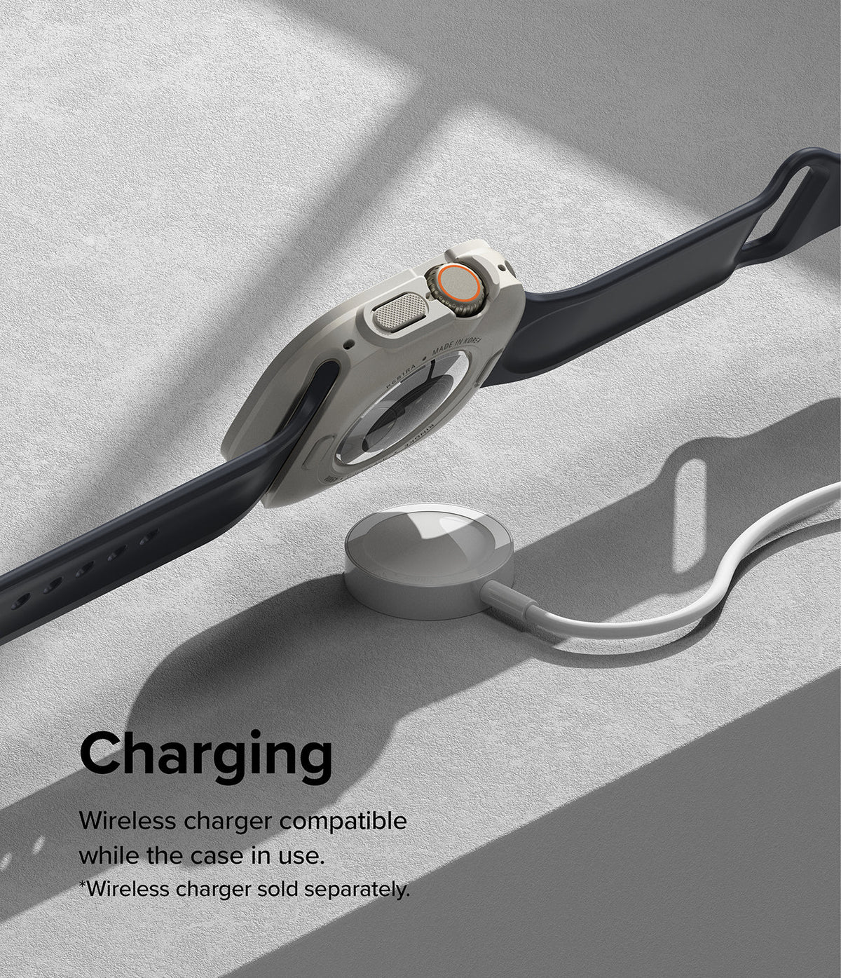 Apple Watch Ultra 3 / 2 / 1 Case | Air Sports - Beige protective case on Apple Watch Ultra charging on a wireless puck.