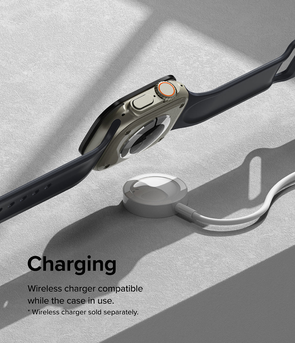 Apple Watch Ultra 3 / 2 / 1 | Glass + Bezel Styling Combo - Apple Watch Ultra with protective case hovering over a wireless charger.
