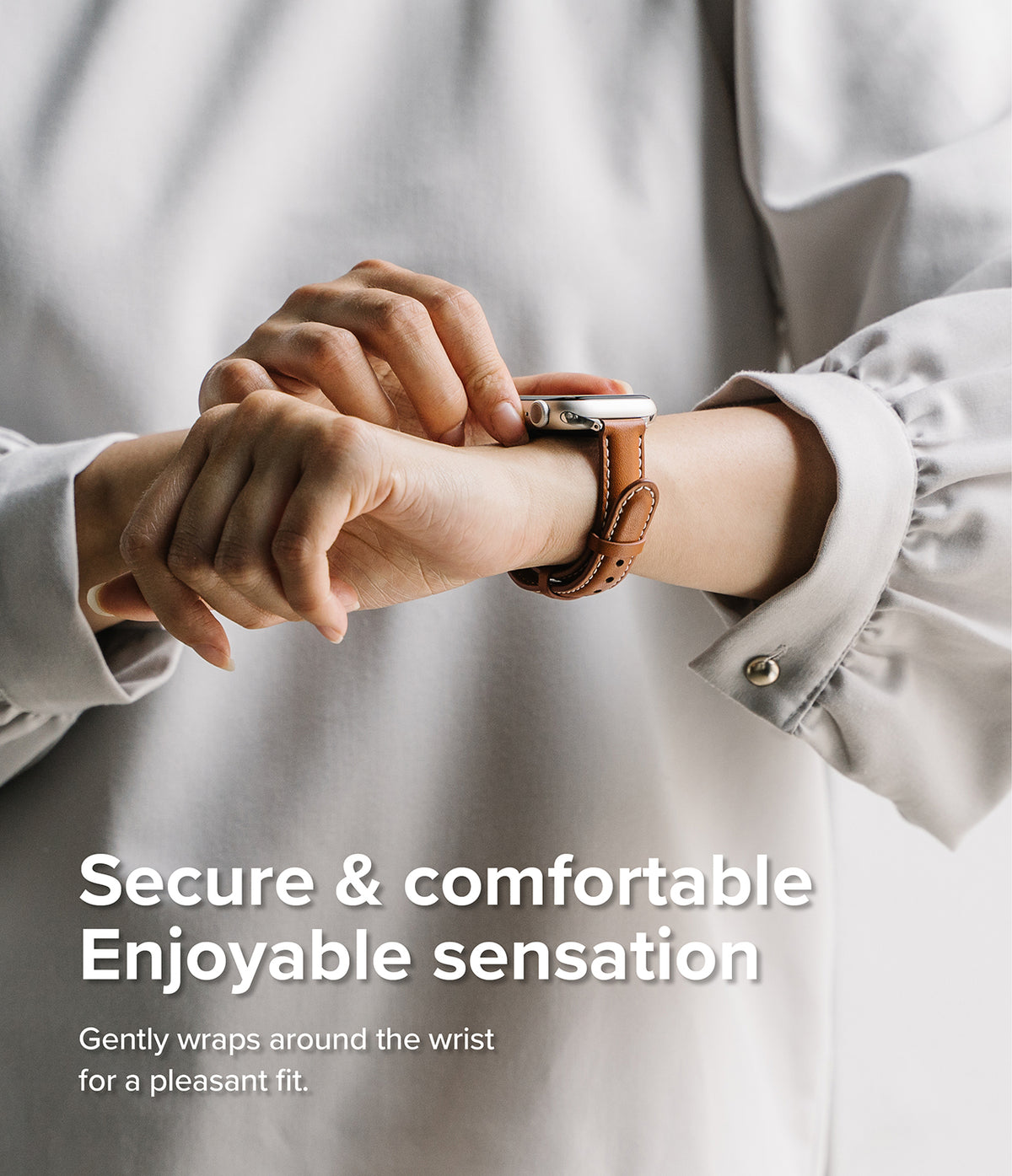 Apple Watch 42·41·40·38 mm | Leather One Padded Slim - A person wearing a slim brown leather watch band on their wrist.