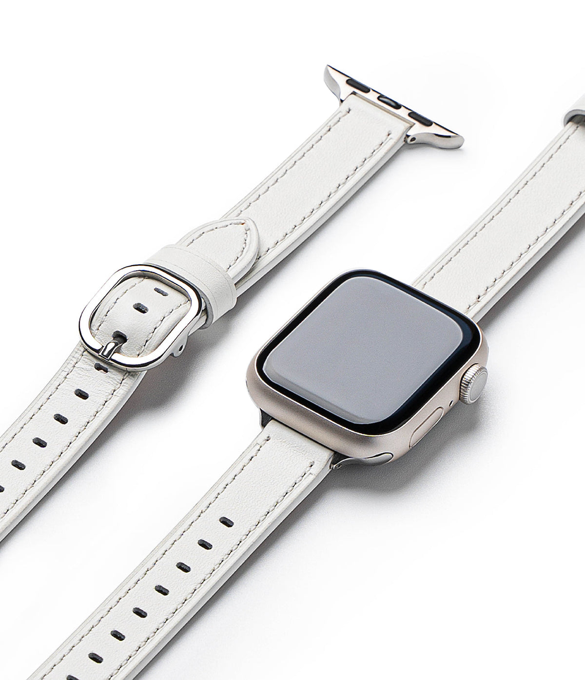 Apple Watch 42·41·40·38 mm | Leather One Slim Band - A slim white leather watch band attached to a silver Apple Watch.