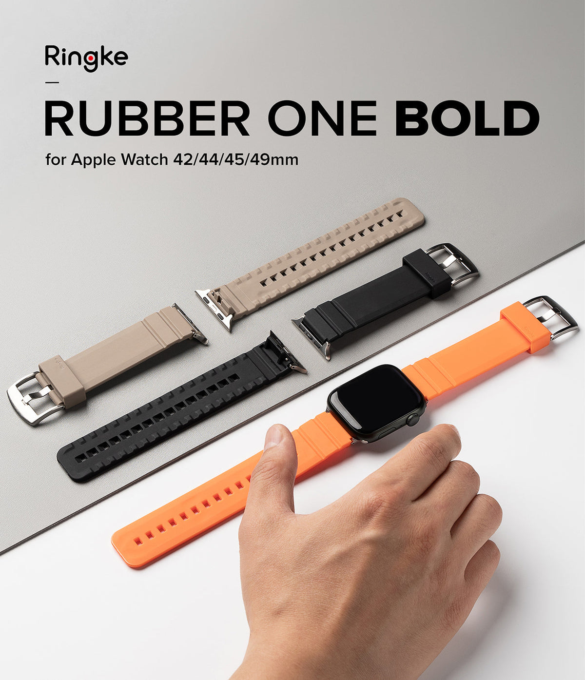 Apple Watch 49·46·45·44·42mm | Rubber One Bold Band - Three rubber watch bands in beige, black, and orange with an Apple Watch.