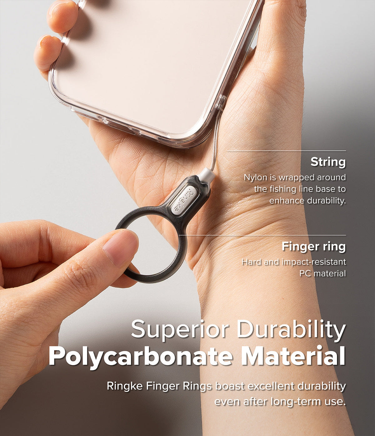 Buckle Finger Ring Strap - Hand holding a phone with a durable nylon-wrapped string and impact-resistant PC finger ring.