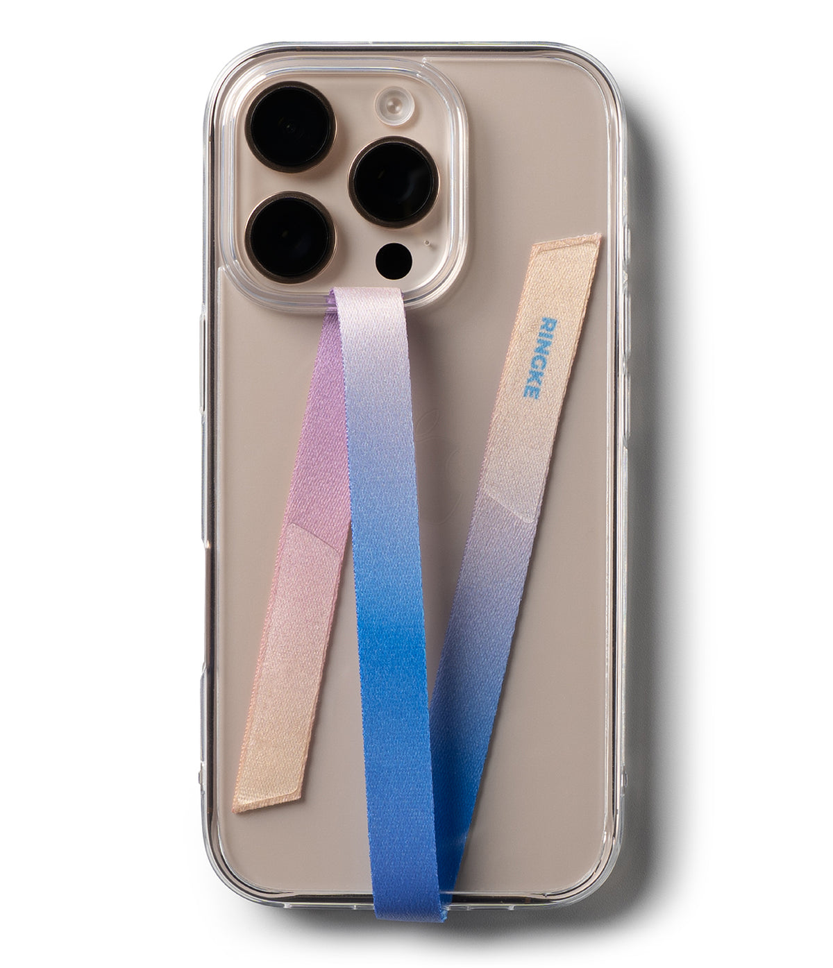 Band Strap - Smartphone in a clear case with a pink-to-blue gradient fabric strap attached to the camera and bottom edge.